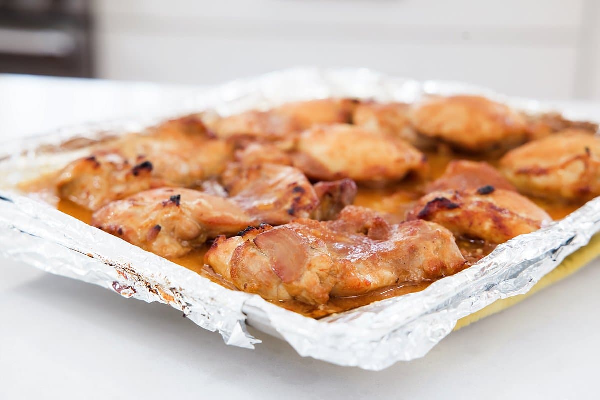 baking sheet of teriyaki chicken thighs