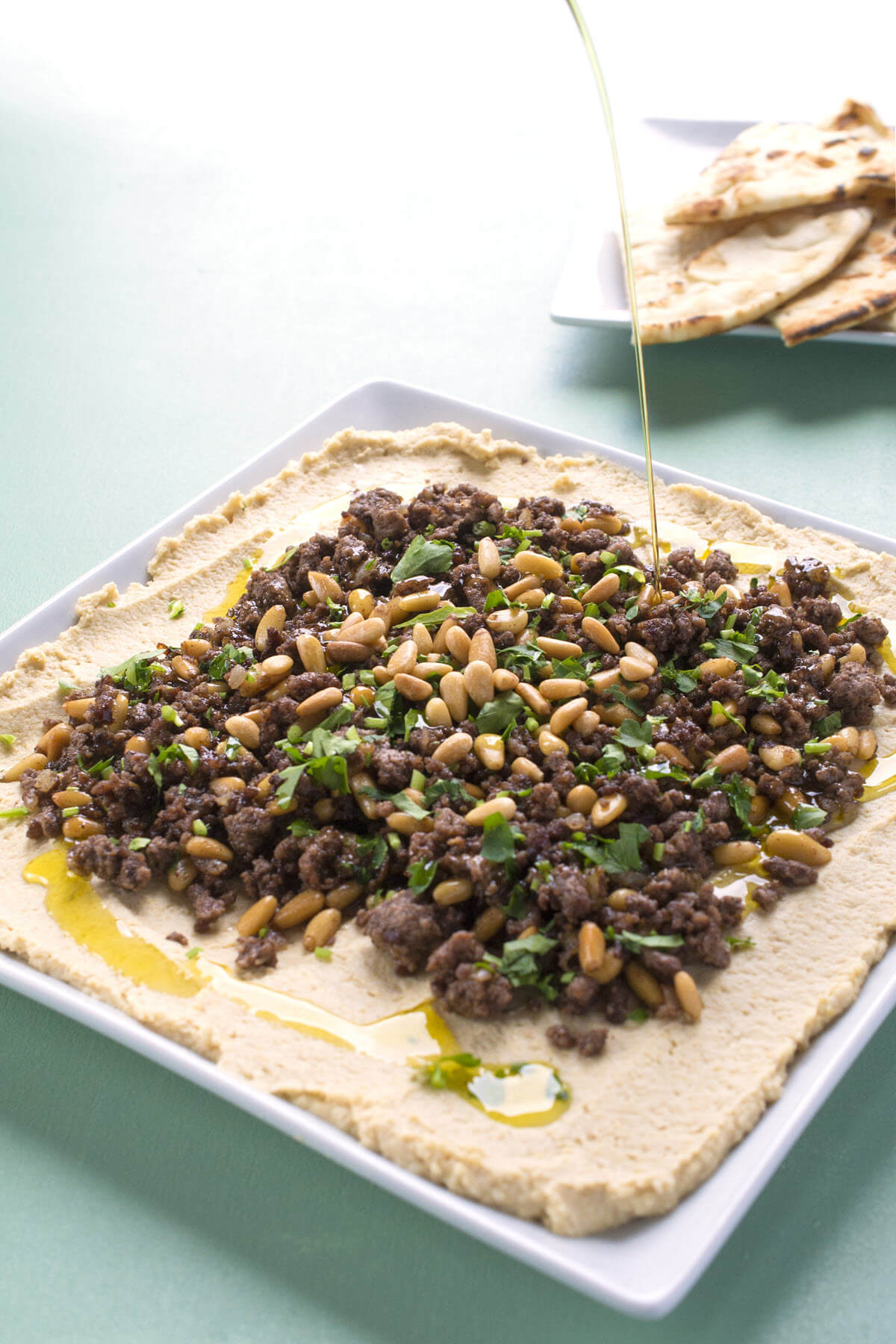 Hummus With Ground Lamb And Toasted Pine Nuts The Lemon Bowl