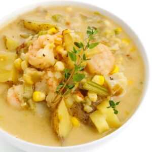 Bowl of easy seafood chowder topped with fresh herbs