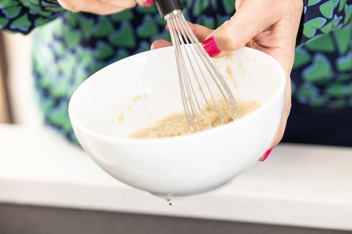 Whisking Water into Tahini Sauce