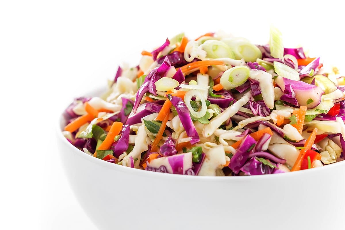 https://thelemonbowl.com/wp-content/uploads/2021/06/Herbed-Slaw-with-Jalapeno-Lime-Vinaigrette_022_WEB.jpg