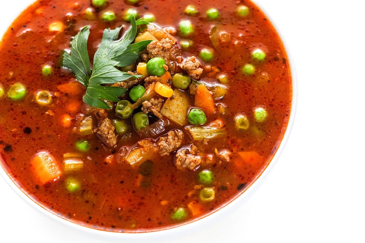 A hearty bowl of lamb vegetable soup.