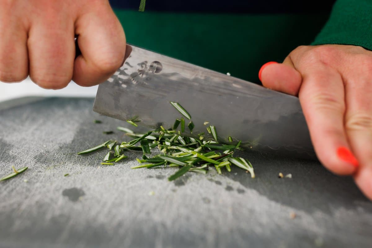 Chopping rosemary