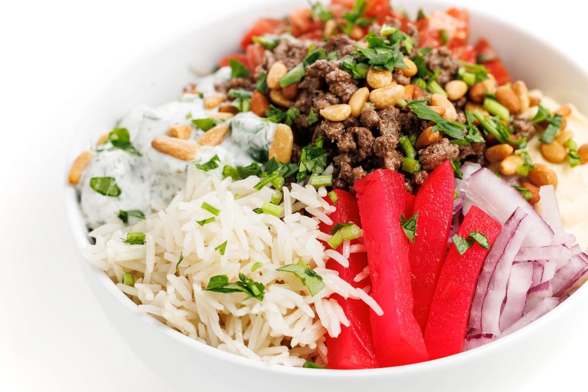 Lebanese beef and rice bowls with hummus.