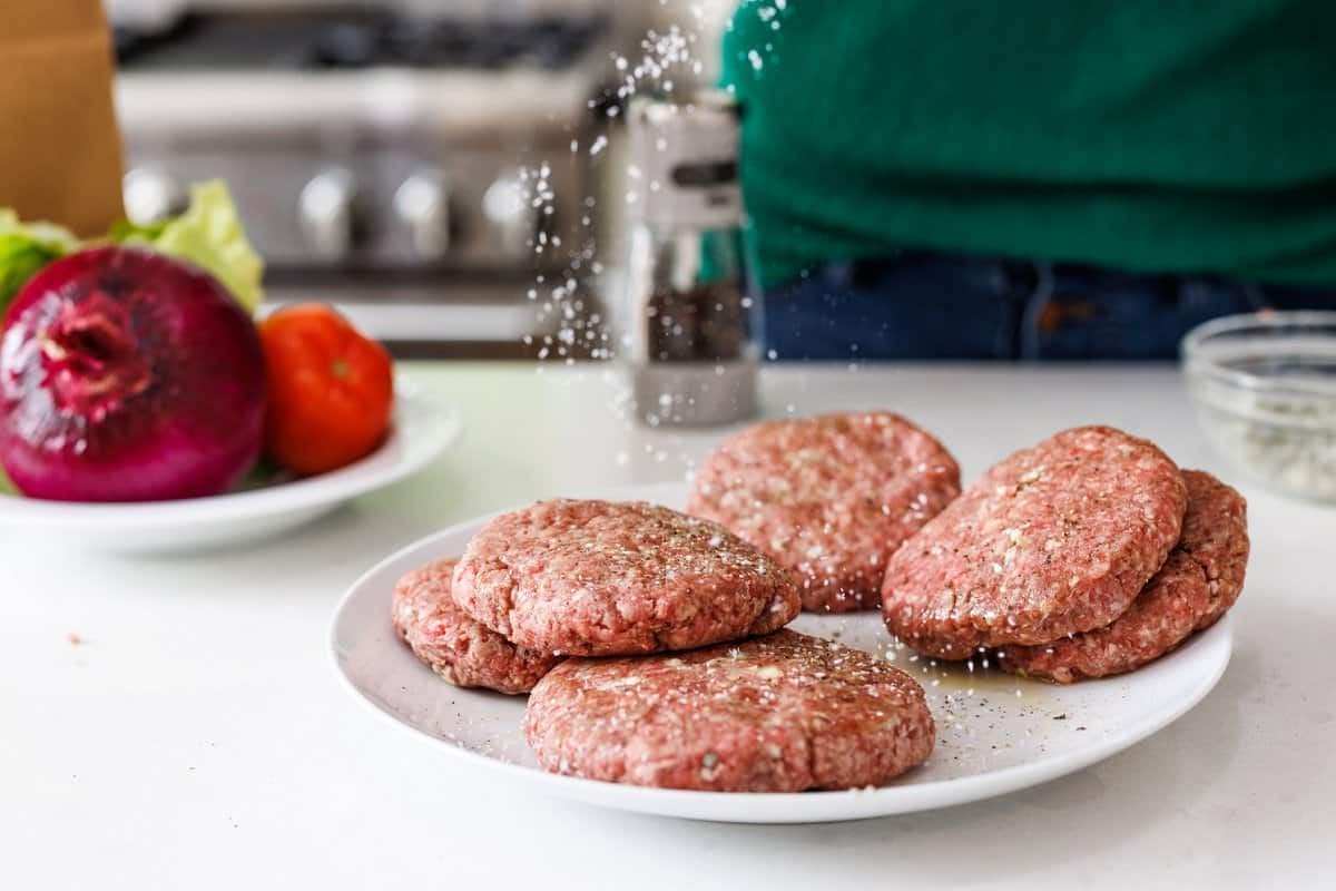 Sprinkle patties with salt and pepper