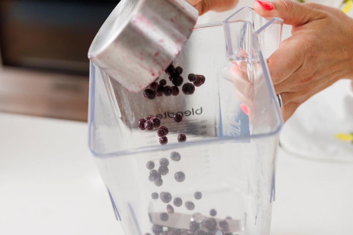 Adding blueberries to blender 1