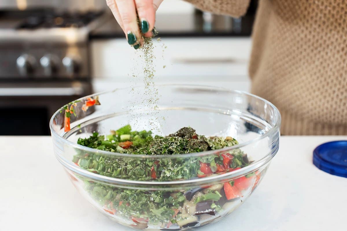 Adding mint to salad