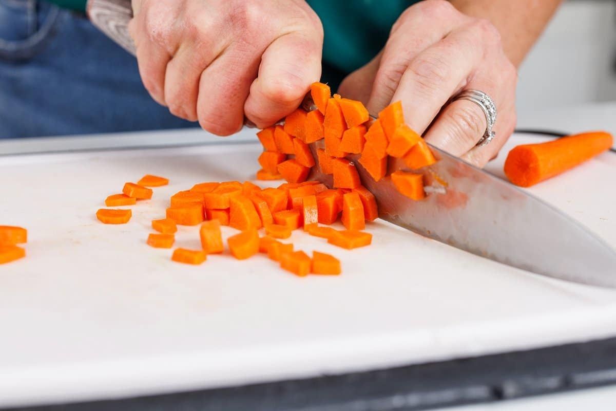 Liz cutting up a carrot