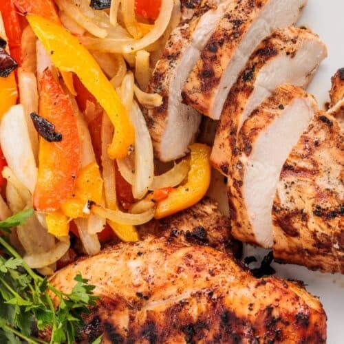 a plate of chicken and vegetables