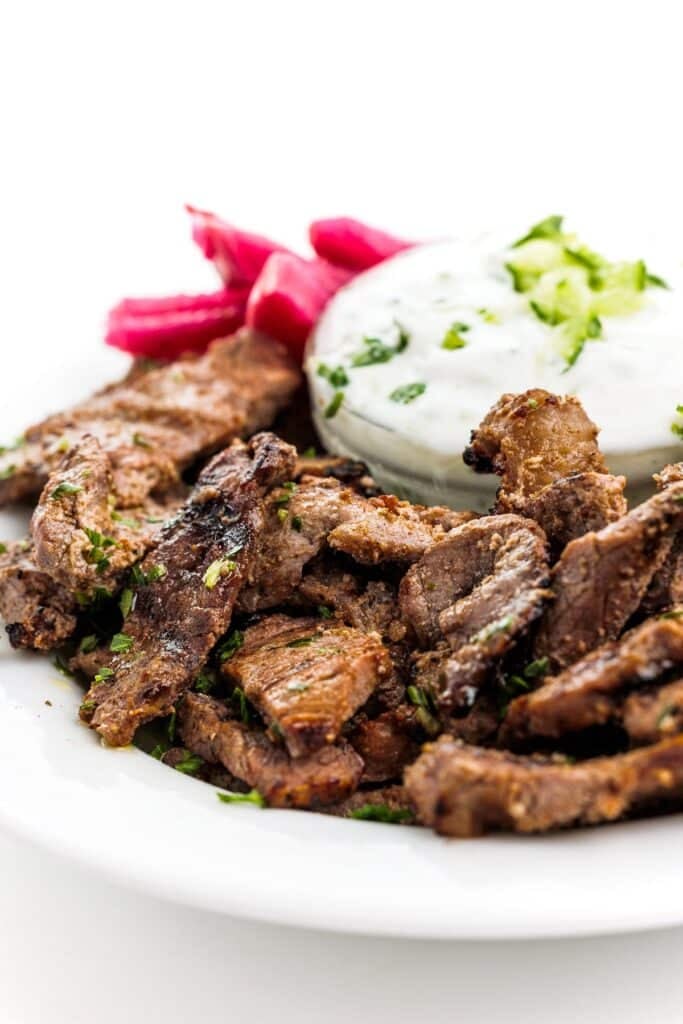 a plate of meat and vegetables