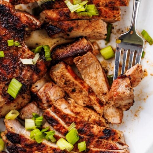 a plate of meat and vegetables