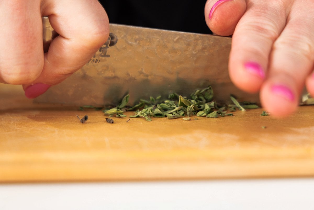 Mincing fresh thyme.