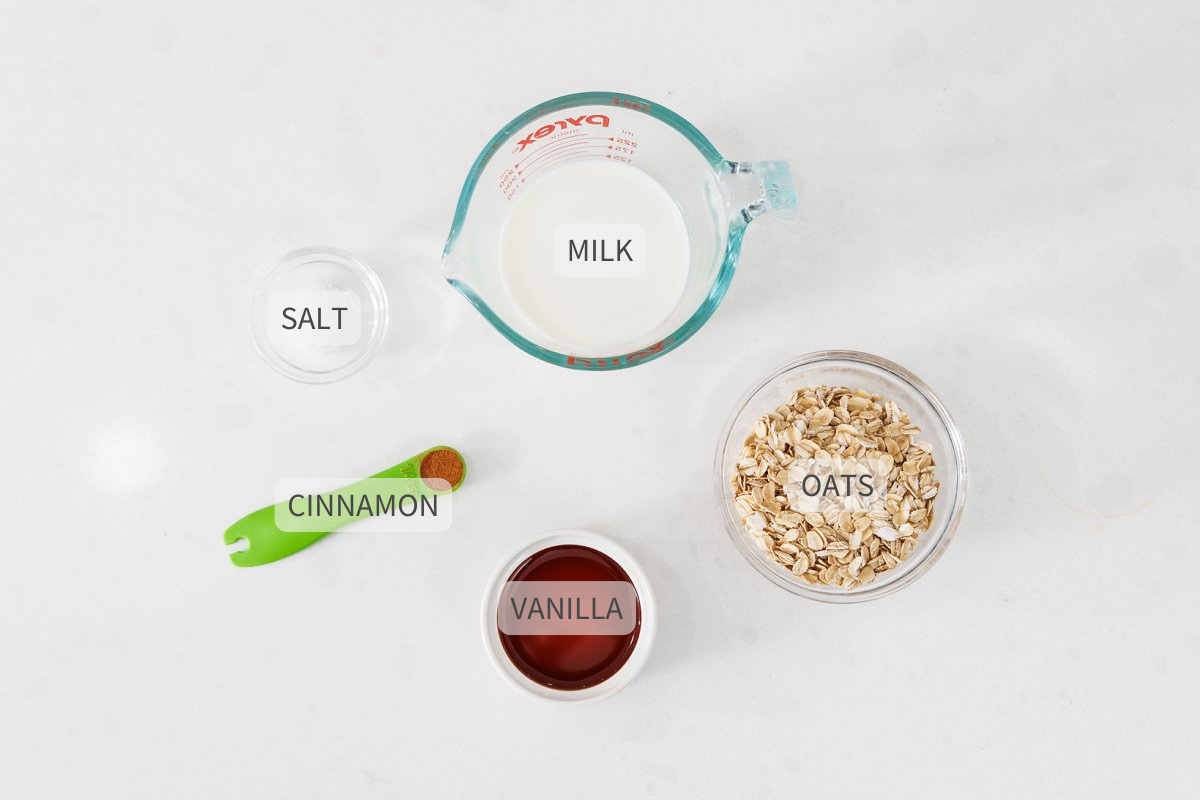 Labeled ingredients for 90 second microwave oatmeal on a white counter.
