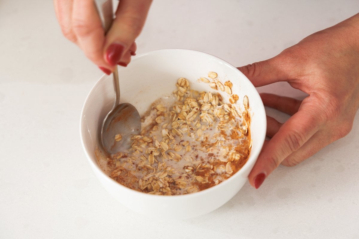 Stirring microwave oatmeal.