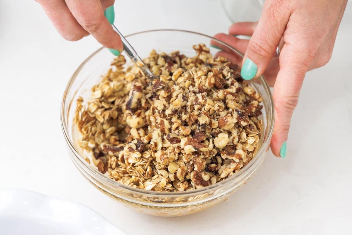 Mixing oat topping.